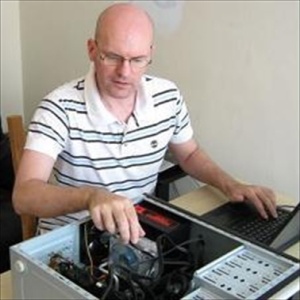 photo of william working on computer here